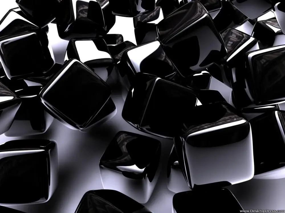 A cluster of glossy black cubes randomly arranged, reflecting light on a white background, creating a modern, abstract, and dynamic visual effect.