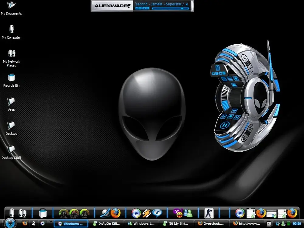 Futuristic desktop theme featuring an alien helmet icon and a metallic, blue-accented circular interface on a dark background. Sleek and tech-focused.